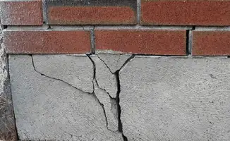 Concrete foundation with serious structural damage in Lowell, MA